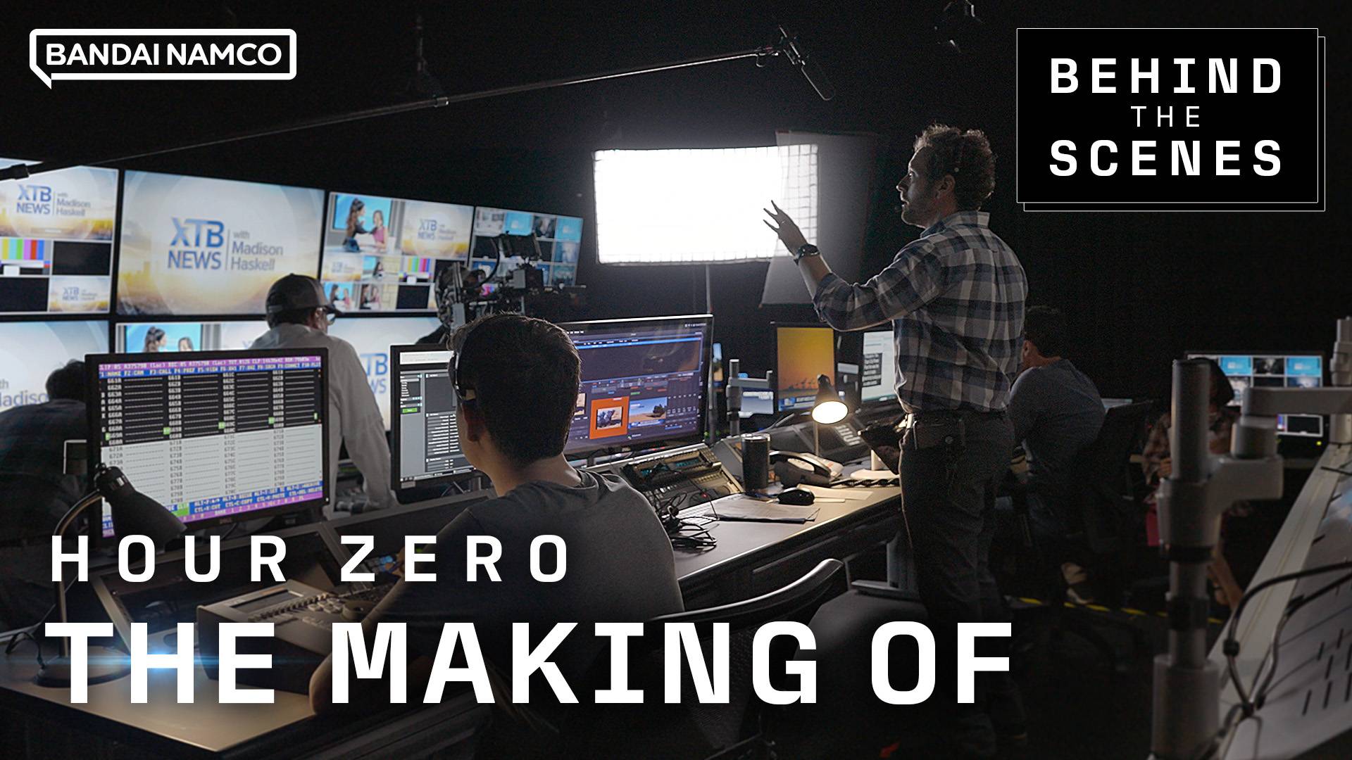 Hour Zero: The Making Of behind-the-scenes thumbnail with crew in a TV news control room, Bandai Namco logo